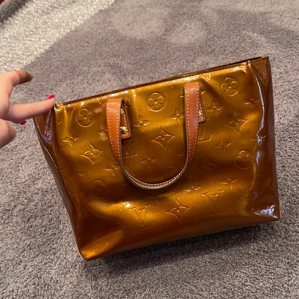 Re-posh authentic Louis Vuitton